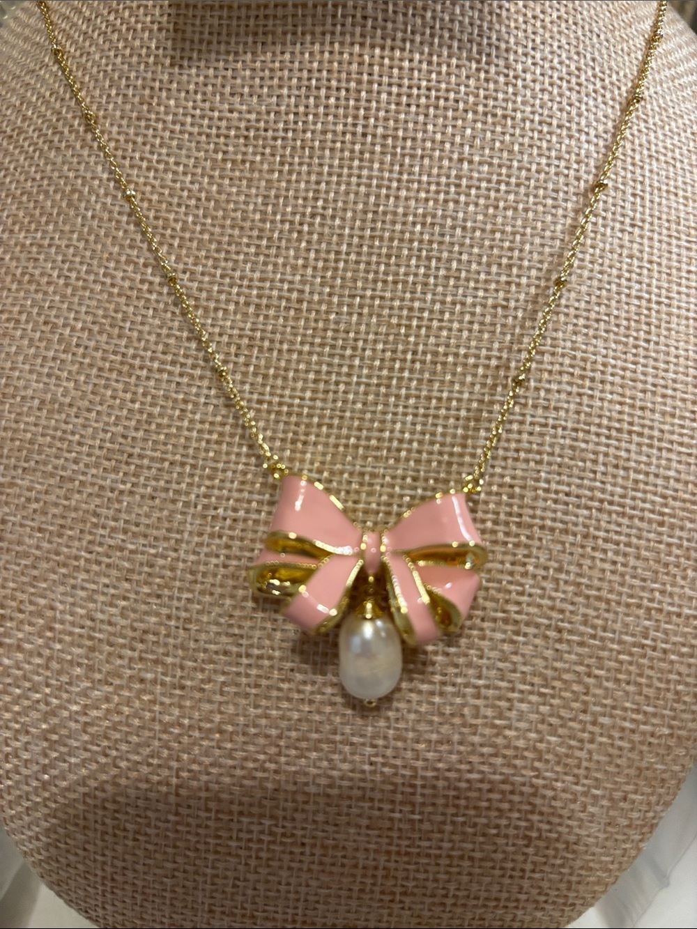 Kendra Scott Gold Necklace with Pink Enamel Bow and Pearl Drop